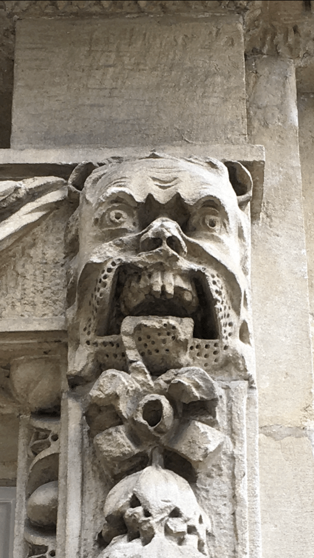 A photo of a stone gargoyle