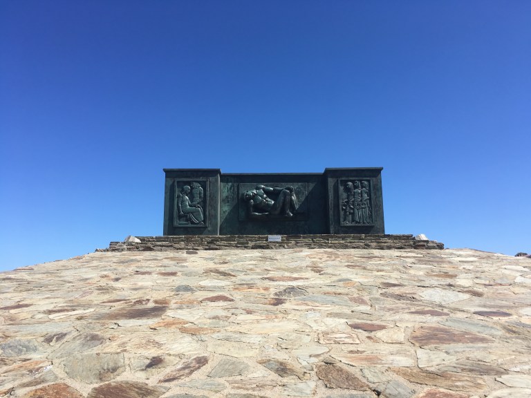 A photo of a bronze copy of Maillol’s war memorial against a clear blue sky